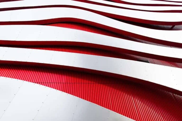 Modern architectural design featuring red and white curves at Lake Michigan Wines.